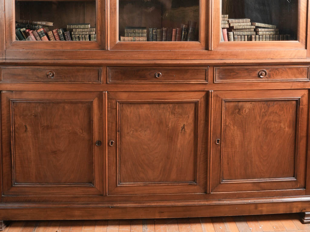 Antique French walnut double-door bookcase