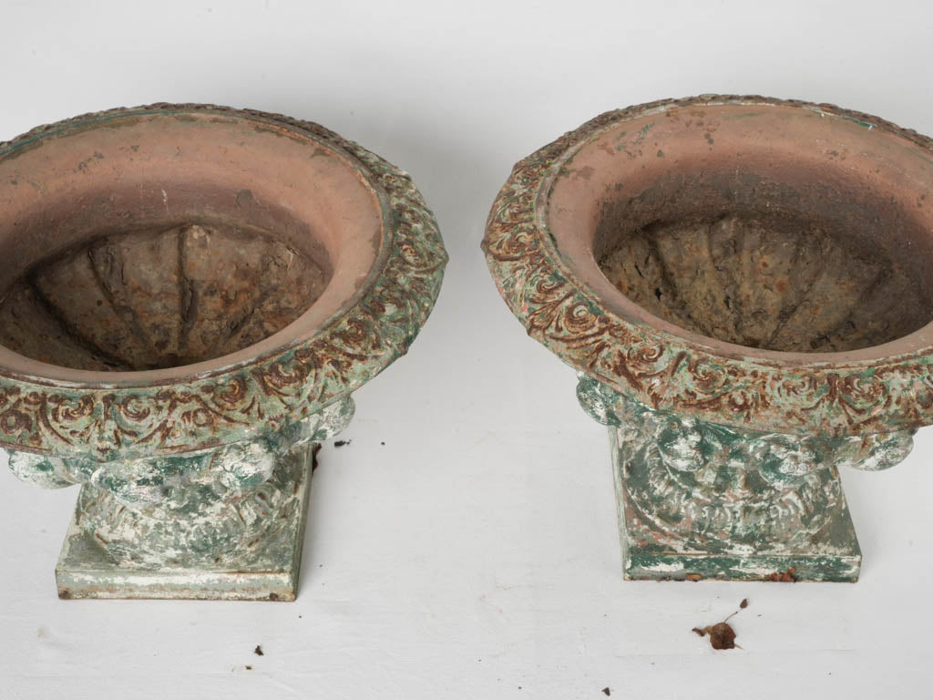 Antique scroll-bordered planters