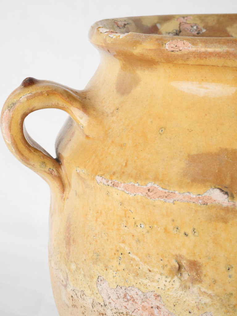 Traditional yellow half-glazed confit pot