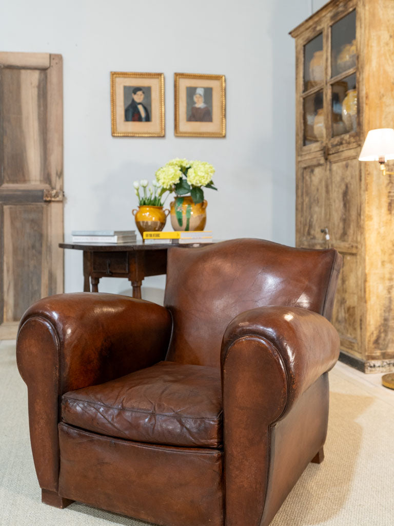 Pair of restored antique French leather club chairs