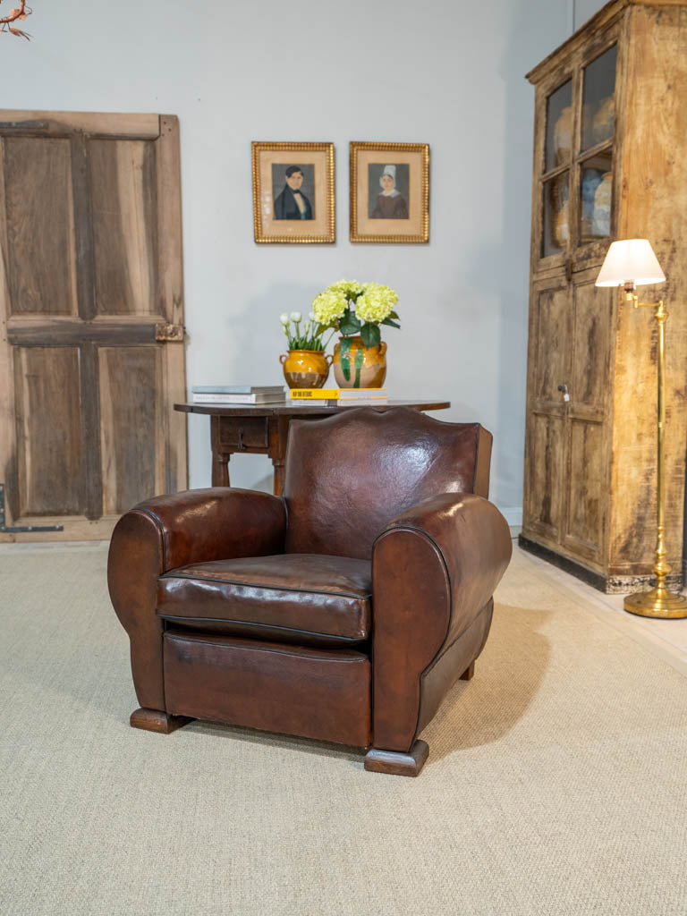 Antique French leather club chair - moustache back