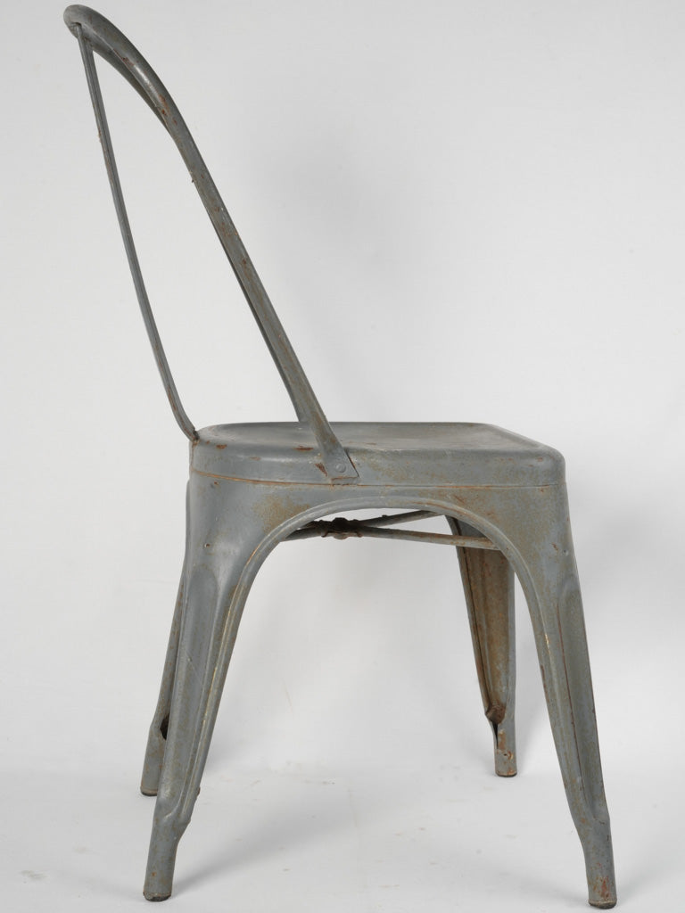 Industrial chic grey Tolix patio chair