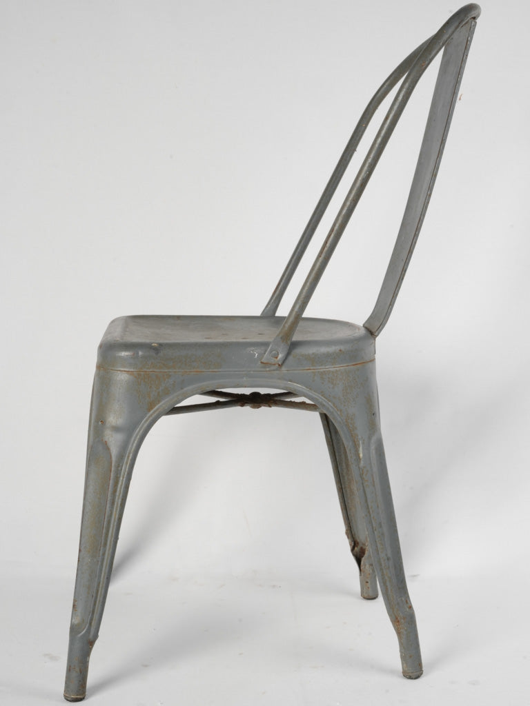 Timeless gray metal Tolix armchair