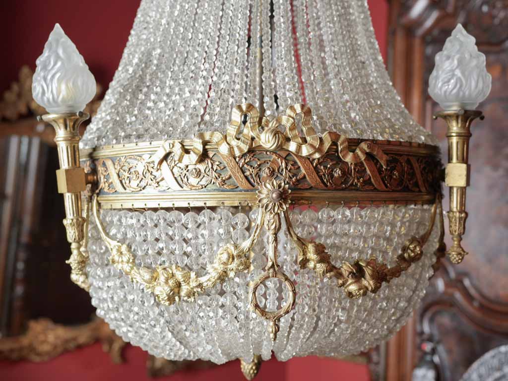 Detailed, crafted crystal and bronze chandelier