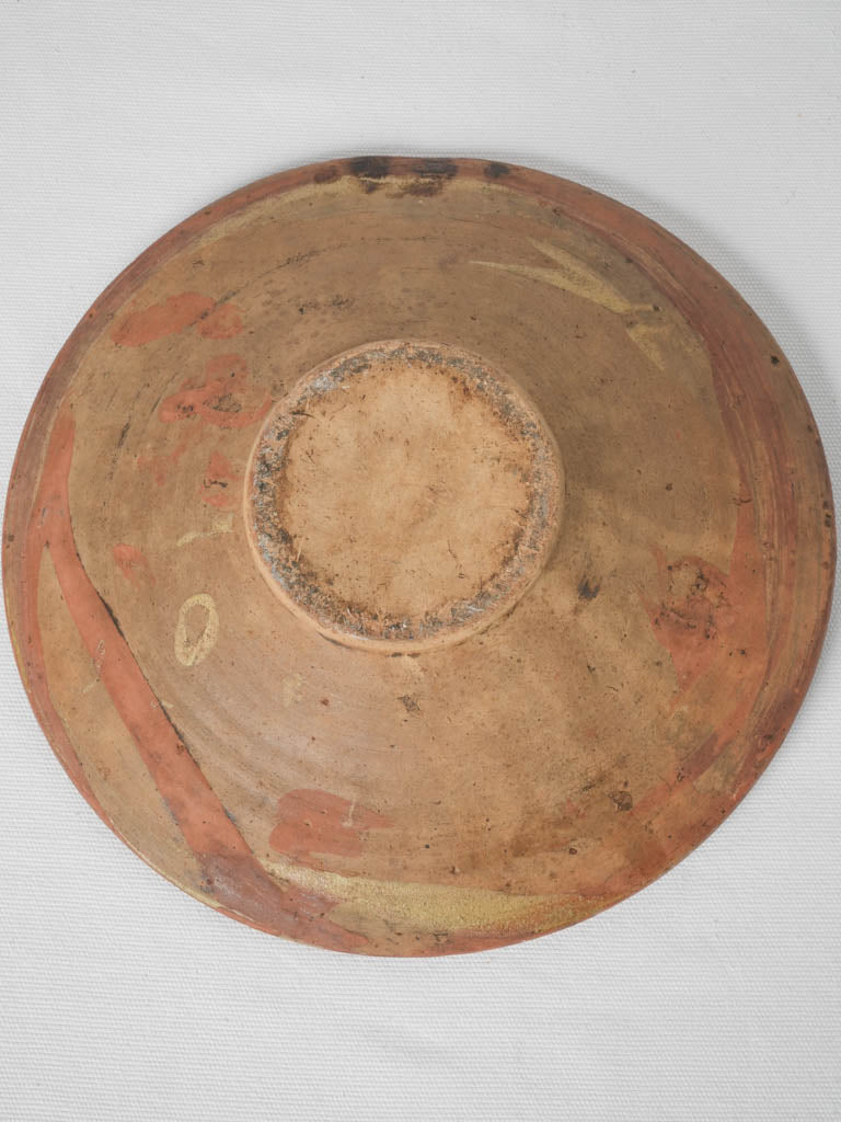 Antique yellow motifs terracotta dish