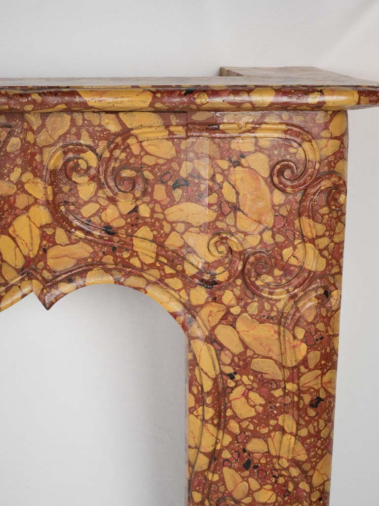 Intricate craftsmen 18th-century fireplace surround