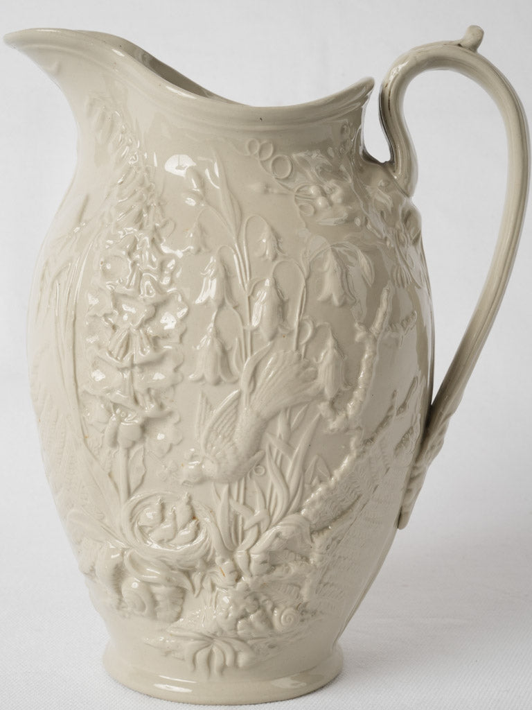 Vintage Sarreguemines bird and butterfly pitcher