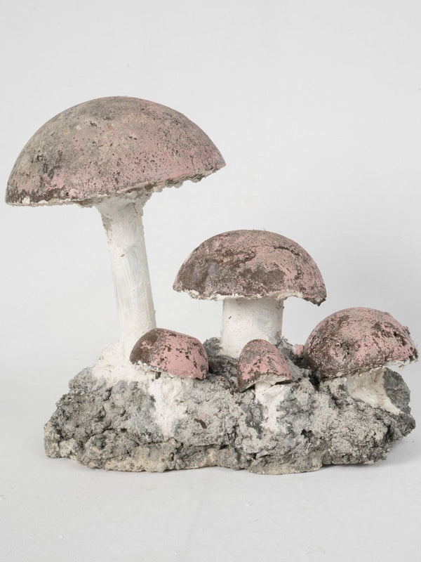 Weathered vintage mushroom garden sculpture