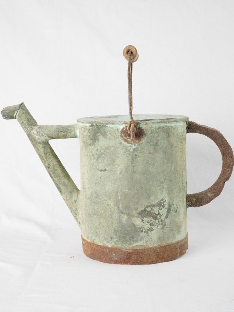 Antique verdigris copper watering can