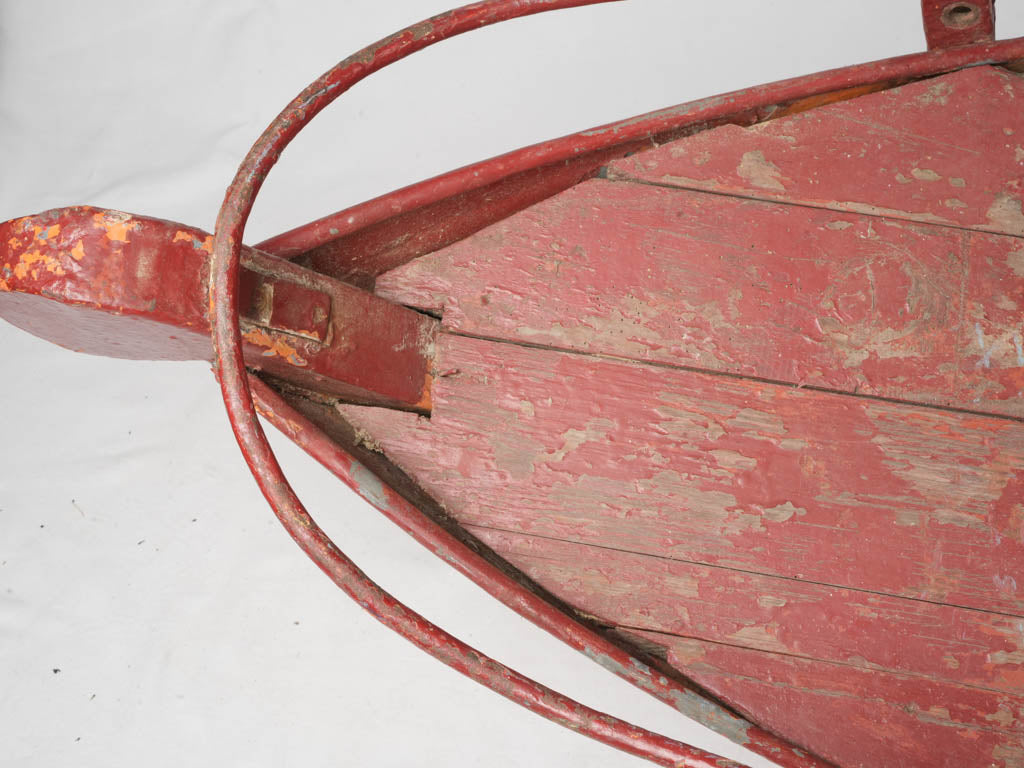 Delightful red painted boat basket