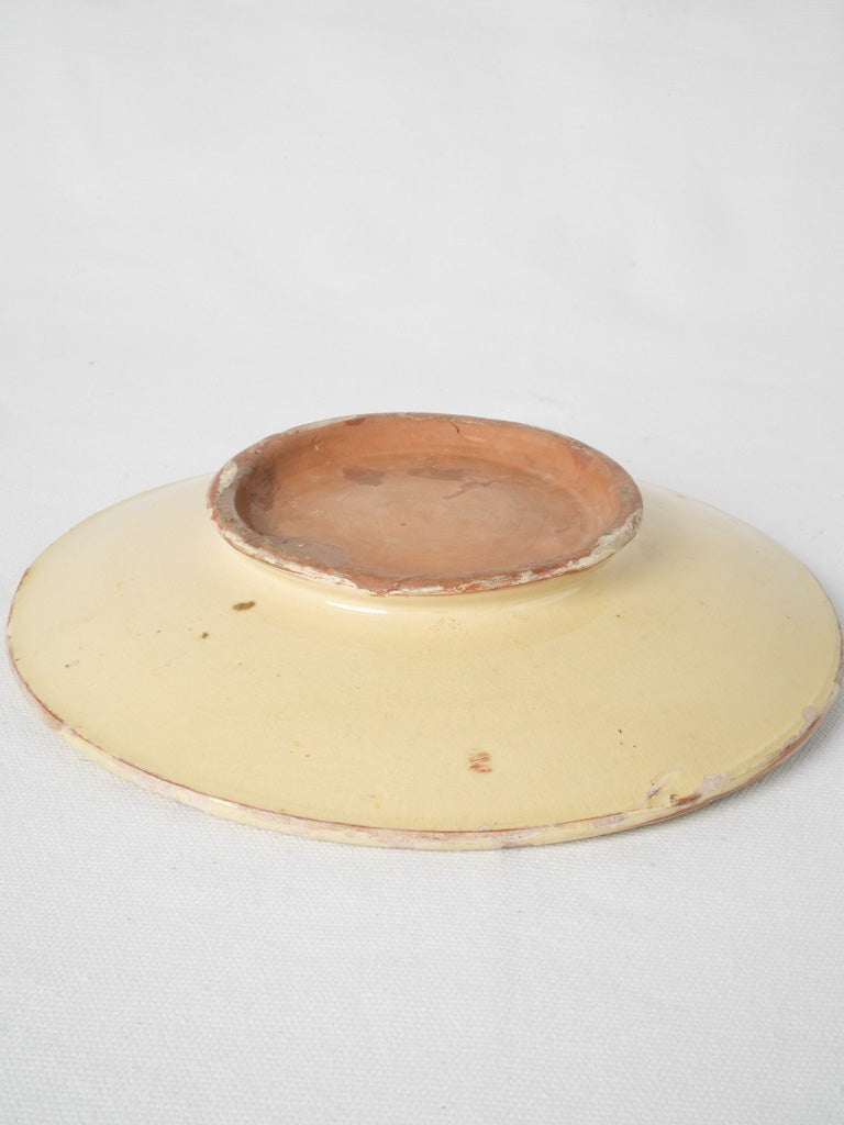 Aged, charming terracotta omelette plate