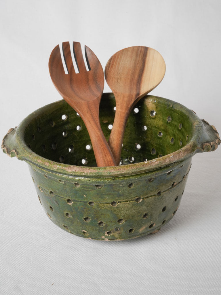 Green-glazed, iridescent, footed terracotta bowl