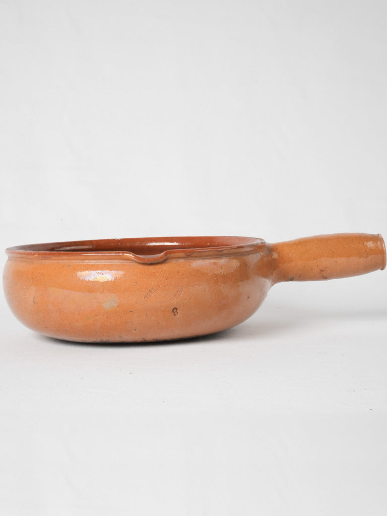 Aged ochre-glazed French poêlon