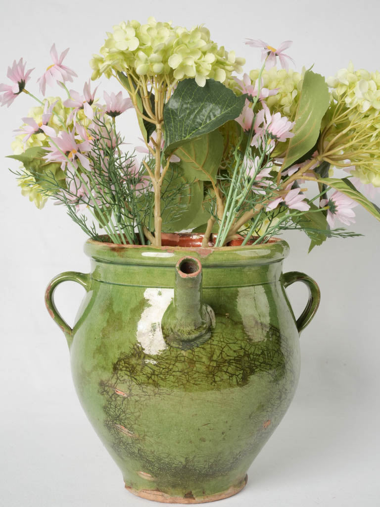 Terracotta long spout green-glazed pitcher