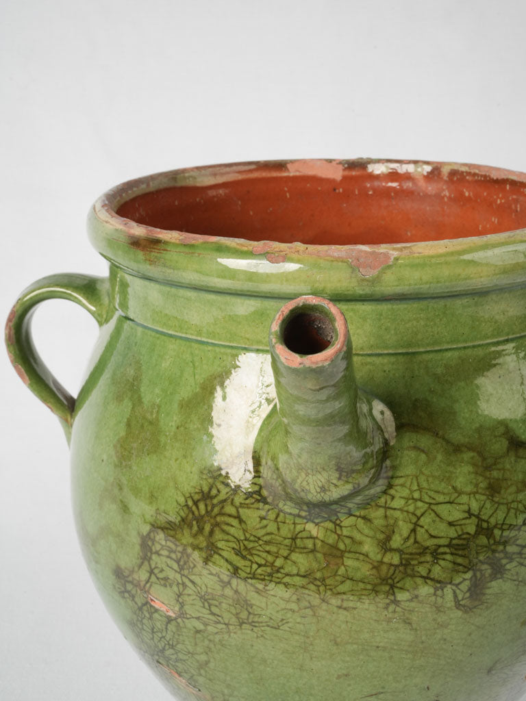 Green-glazed antique French terracotta pitcher