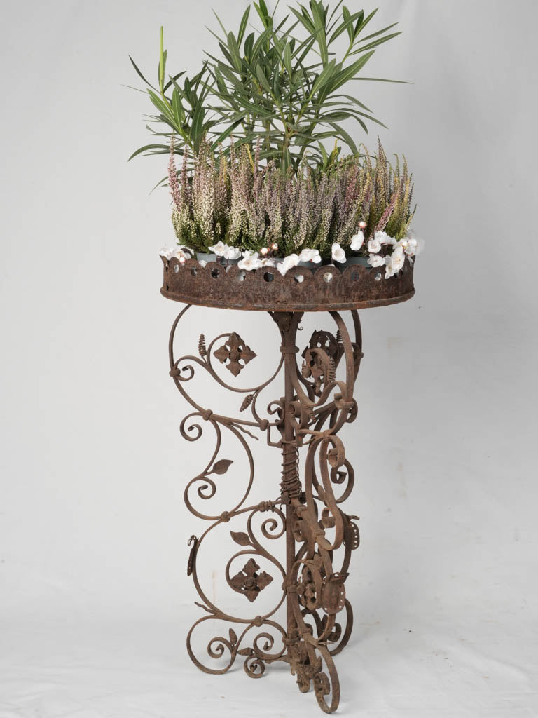 Intricate 19th-century ornate planter stand