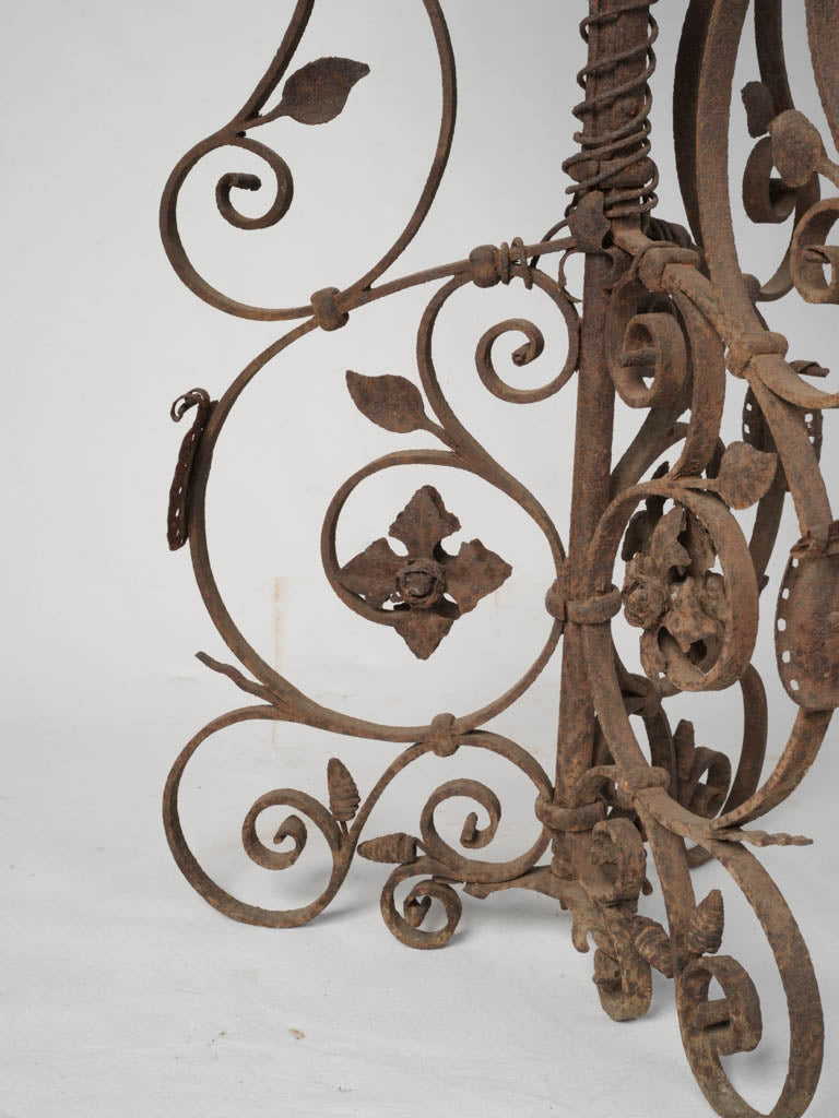 Ornate antique iron floral stand