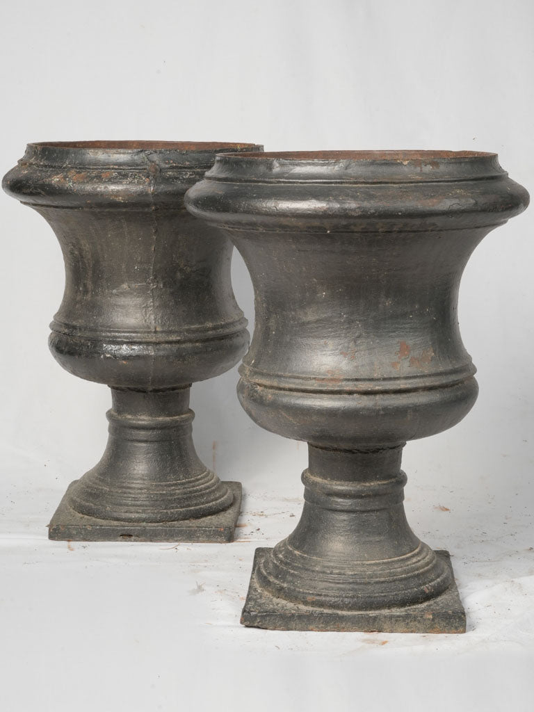 Antique Louis XIV cast iron urns