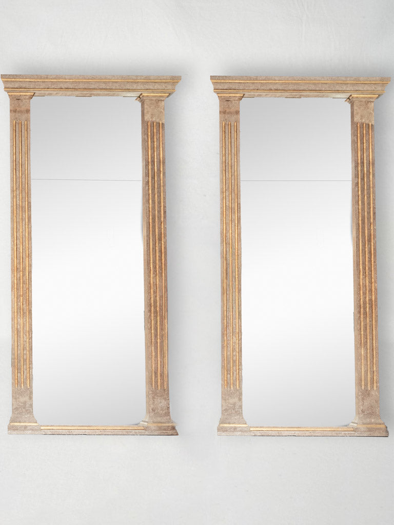 Regal gold-accented mirrors