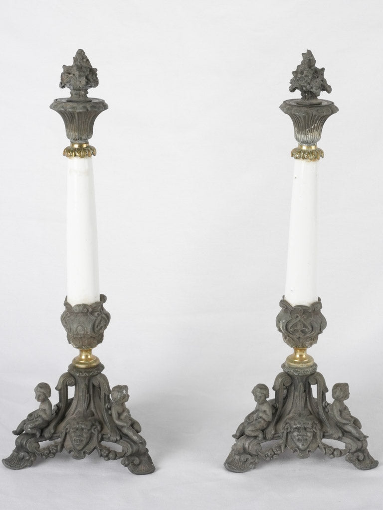 Cherub-adorned nineteenth century candelabras