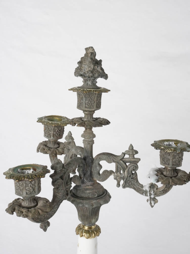 Intricate regule candleholders with lids