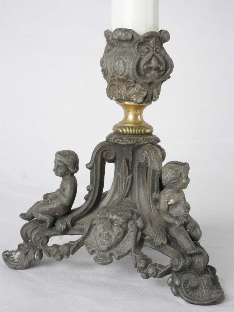 Charming cherub-footed candelabras