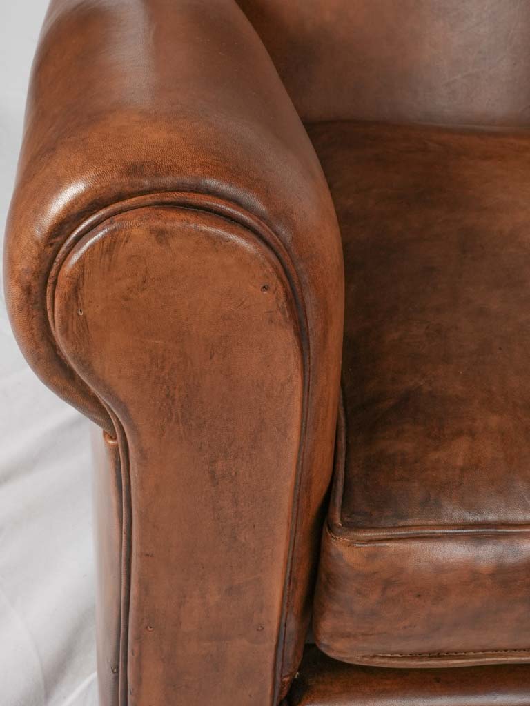 Beautifully patinaed Taittinger club chair