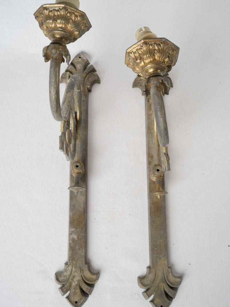 Rustic brass single-light sconces