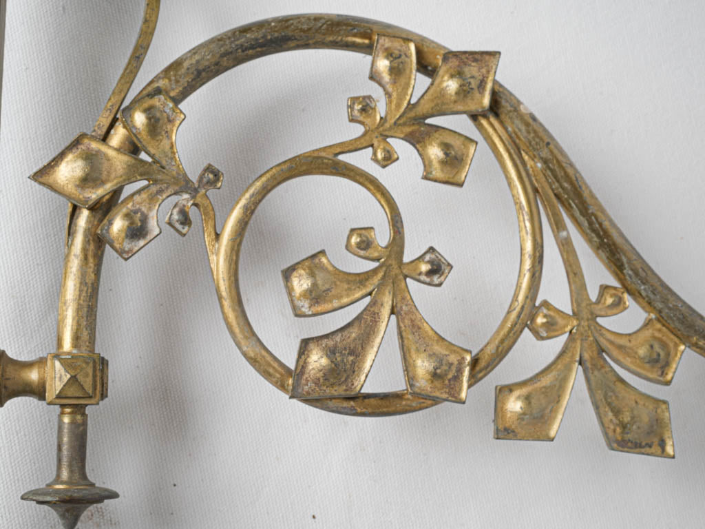 Vintage-inspired single-arm brass sconces