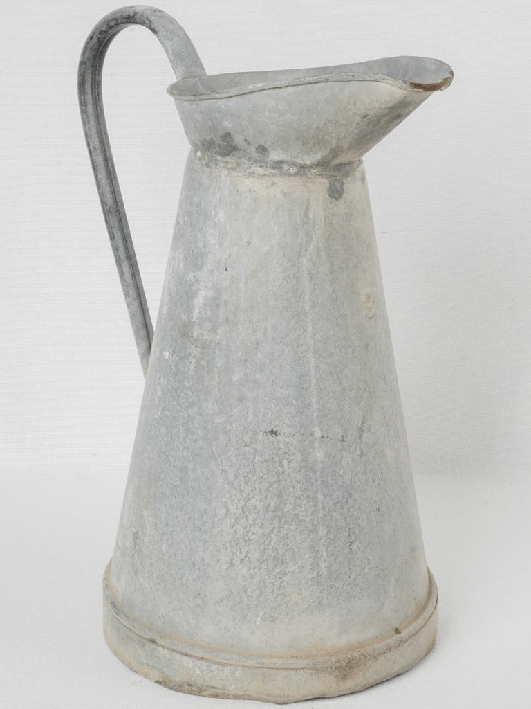 Aged, rustic French zinc pitcher