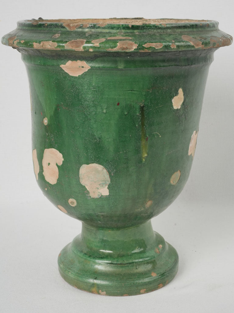 Aged sophisticated castelnaudary green urn