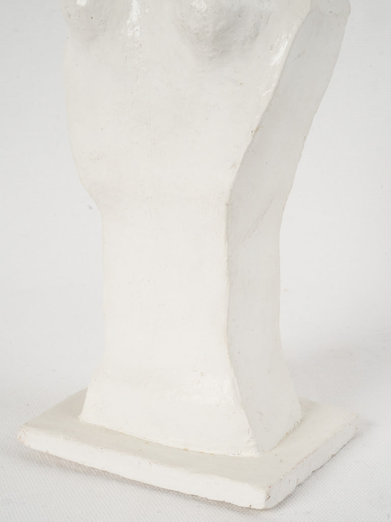 Glossy white glazed sculpture