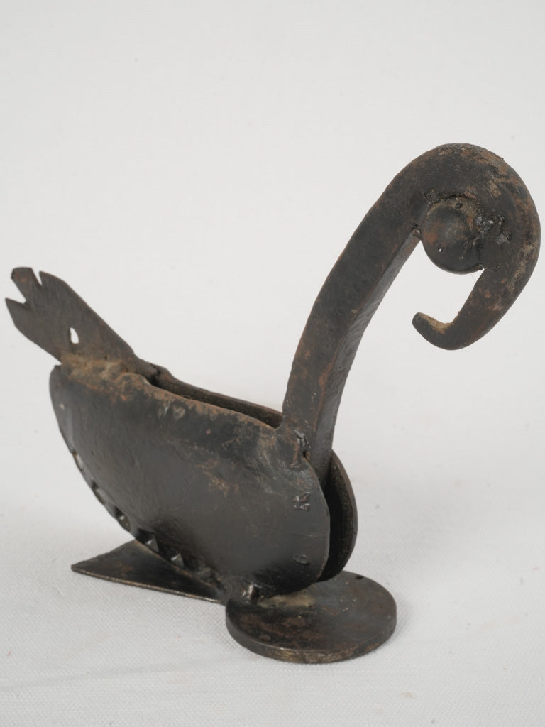 Vintage artisanal iron bird sculpture