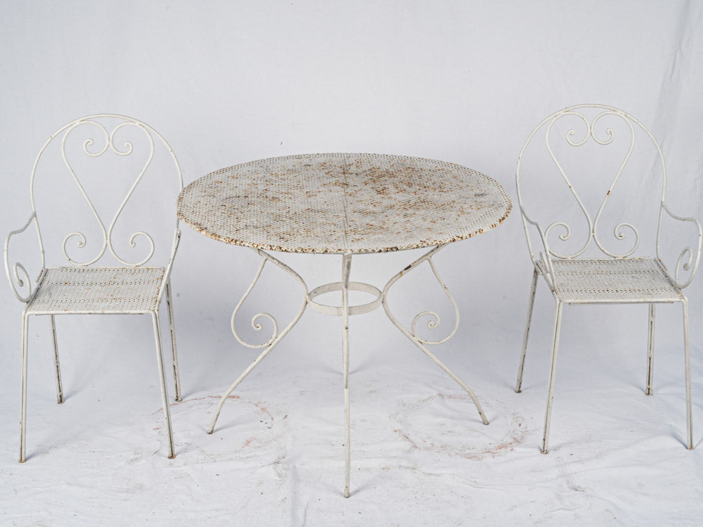 Charming vintage iron patio dining set