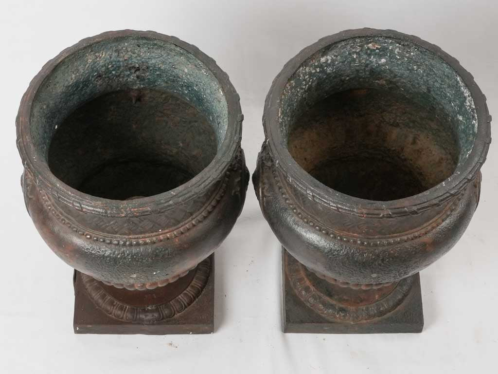 Dominant black Empire period urns