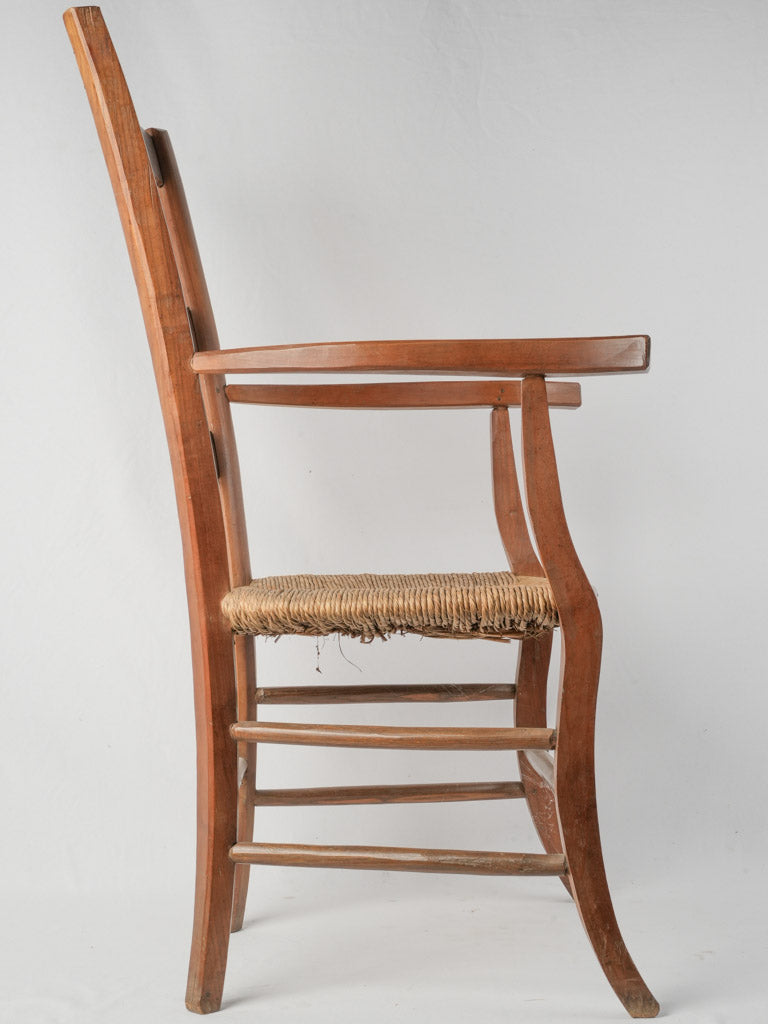 Elegant aged wooden armchair