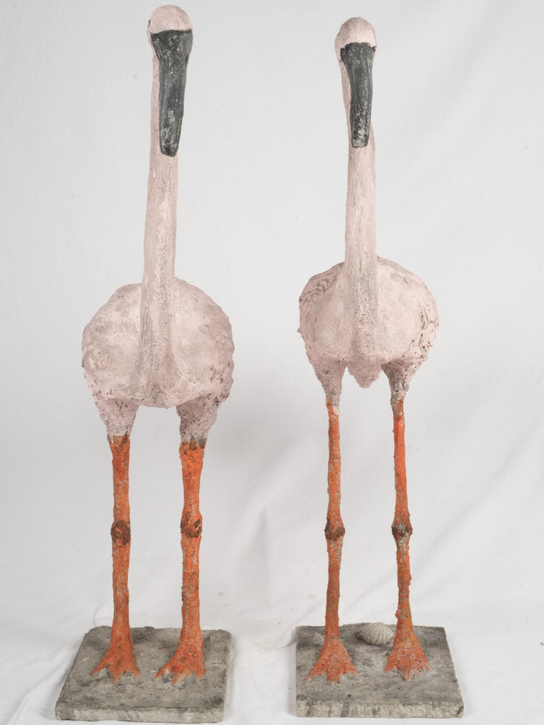 Elegant painted flamingo sculptures