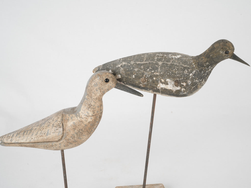 Weathered wooden French decoy birds