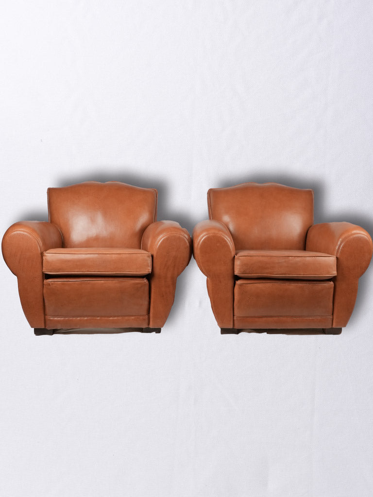 Pair of French leather club chairs - Moustache back