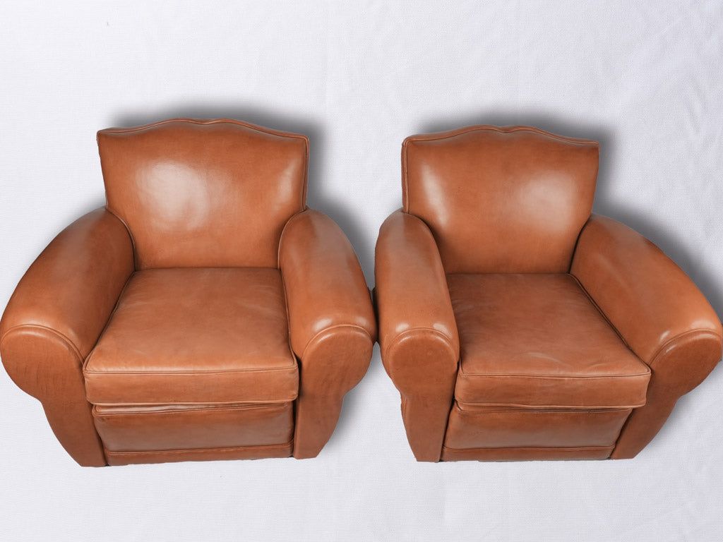 Pair of French leather club chairs - Moustache back