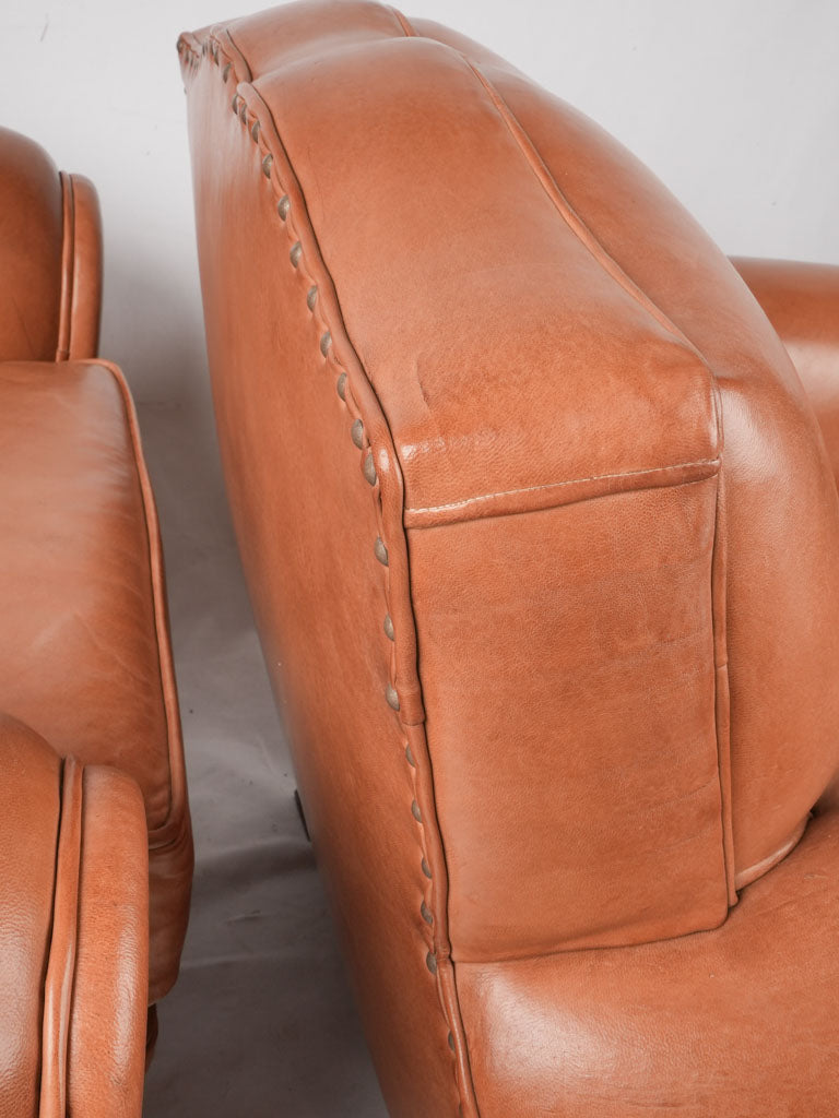 Pair of French leather club chairs - Moustache back