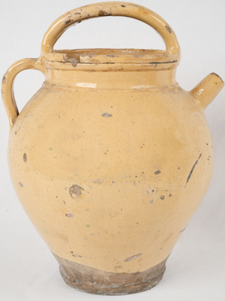 Antique yellow-glazed French water cruche