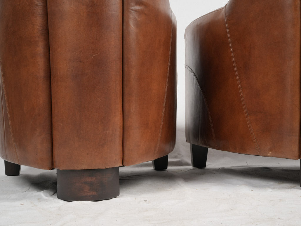 Vintage rich brown leather armchairs