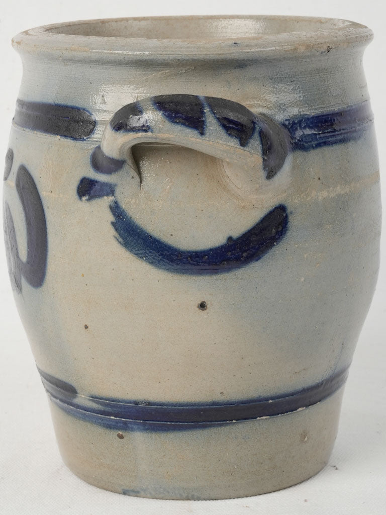 Artisanal blue and white earthenware pot