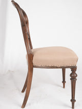 Refined antique linen-upholstered seating pieces