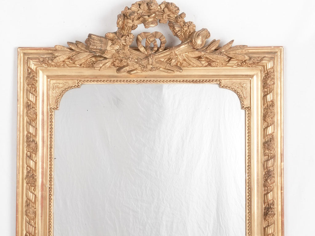 Vintage French trophy-crested wall mirror