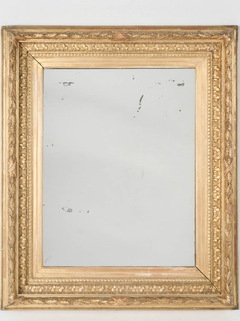 Ornate 19th-century gold leaf mirror