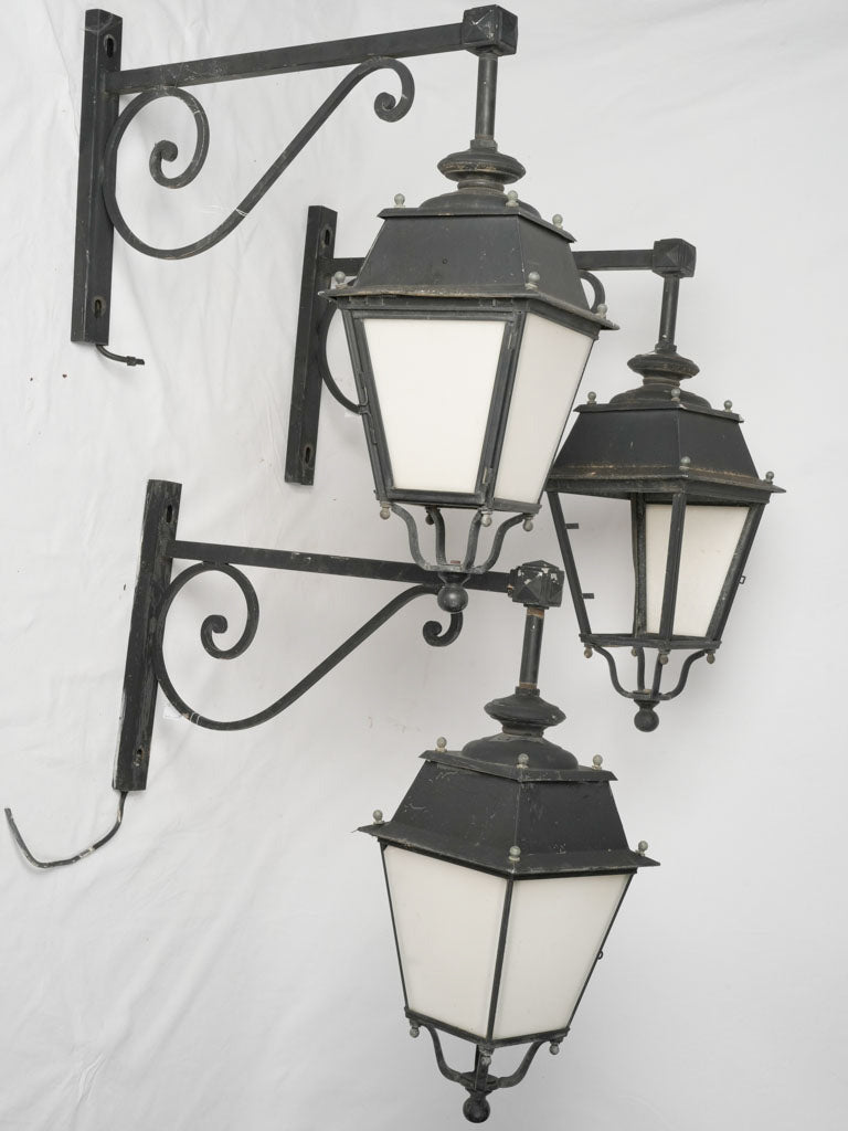 Vintage French wall lanterns with scrolls