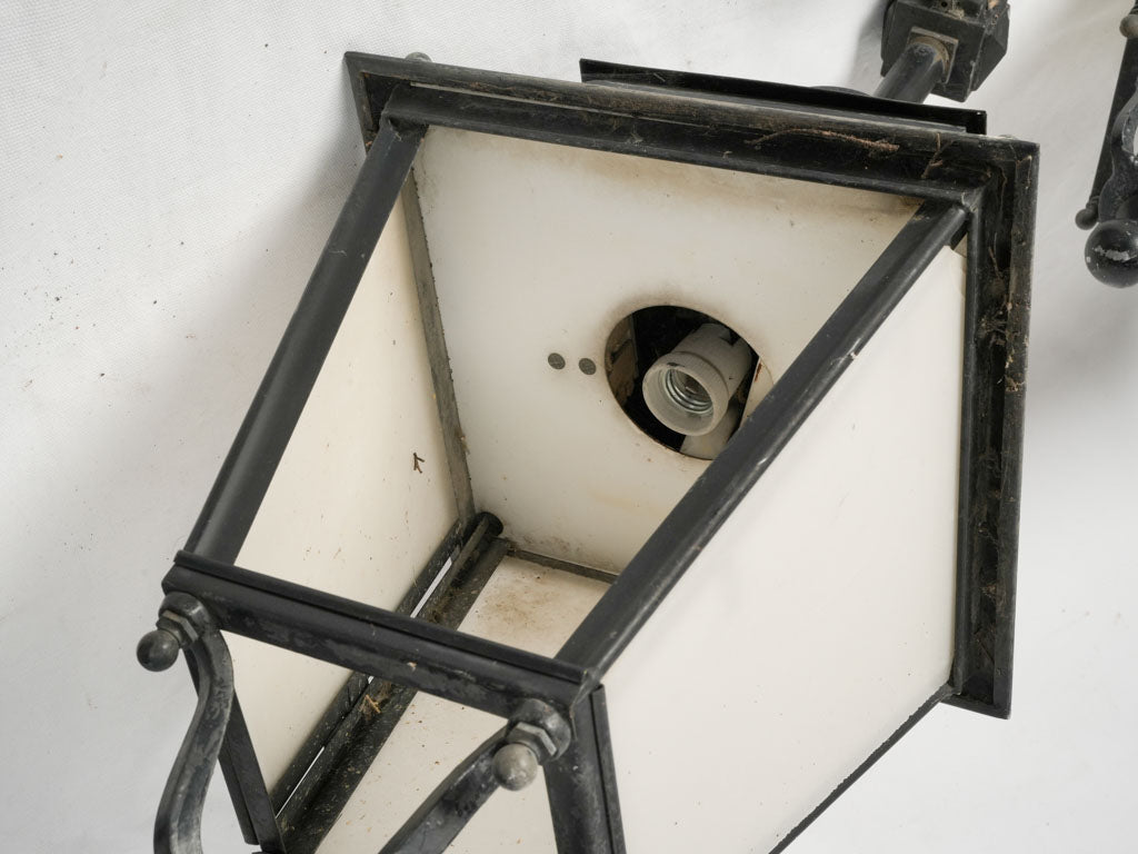 Weathered black iron French village lanterns