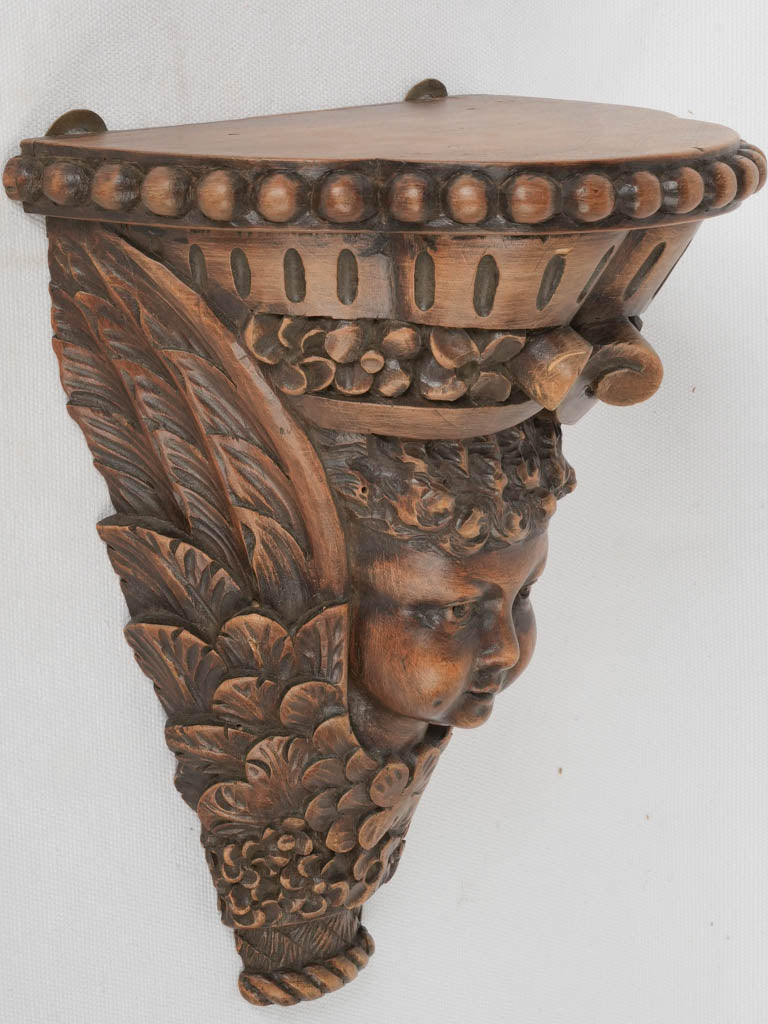 Elegant carved French walnut wall bracket